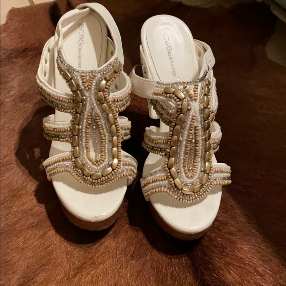 BCBG white beaded pump moderately worn